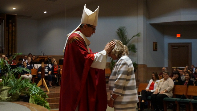 Superintendent Marti West receives blessing from Archbishop Gustavo García-Siller, MSpS. Catholic Convocation Back to School Mass 2018 at St. Mark the Evangelist Catholic Church. Photos: Veronica Markland, Today's Catholic Newspaper