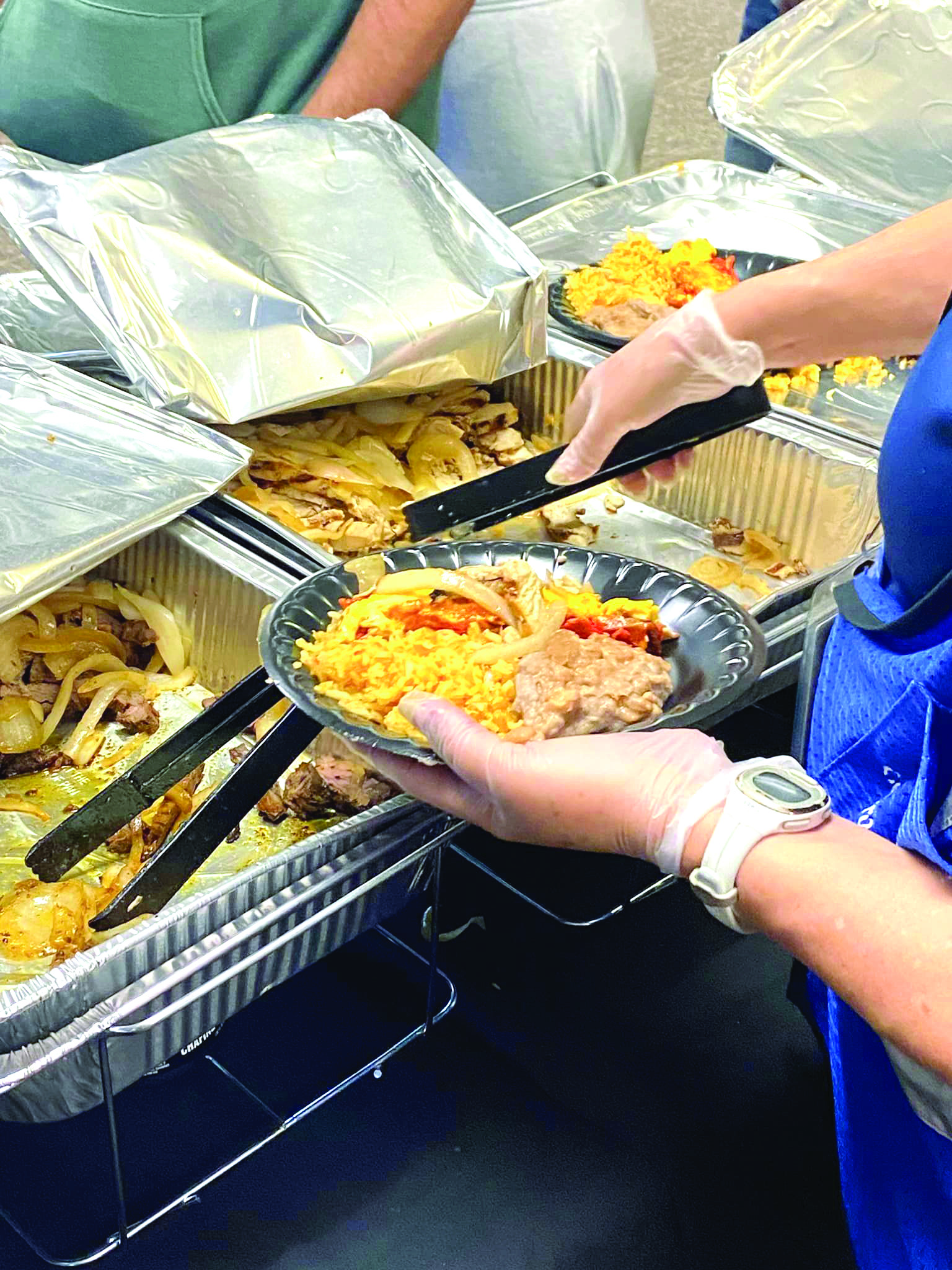 Catholic Charities hosts New Year’s luncheon for migrants